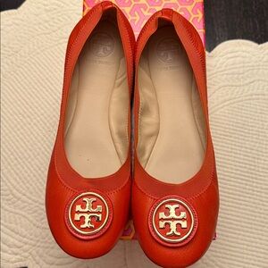 Tory Burch Orange Flats with Gold Emblem